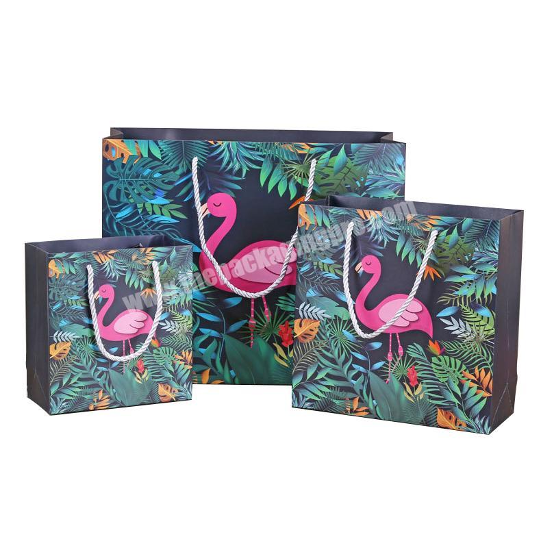 Wholesale luxury flamingo pattern shopping portable paper gift bag with rope handle