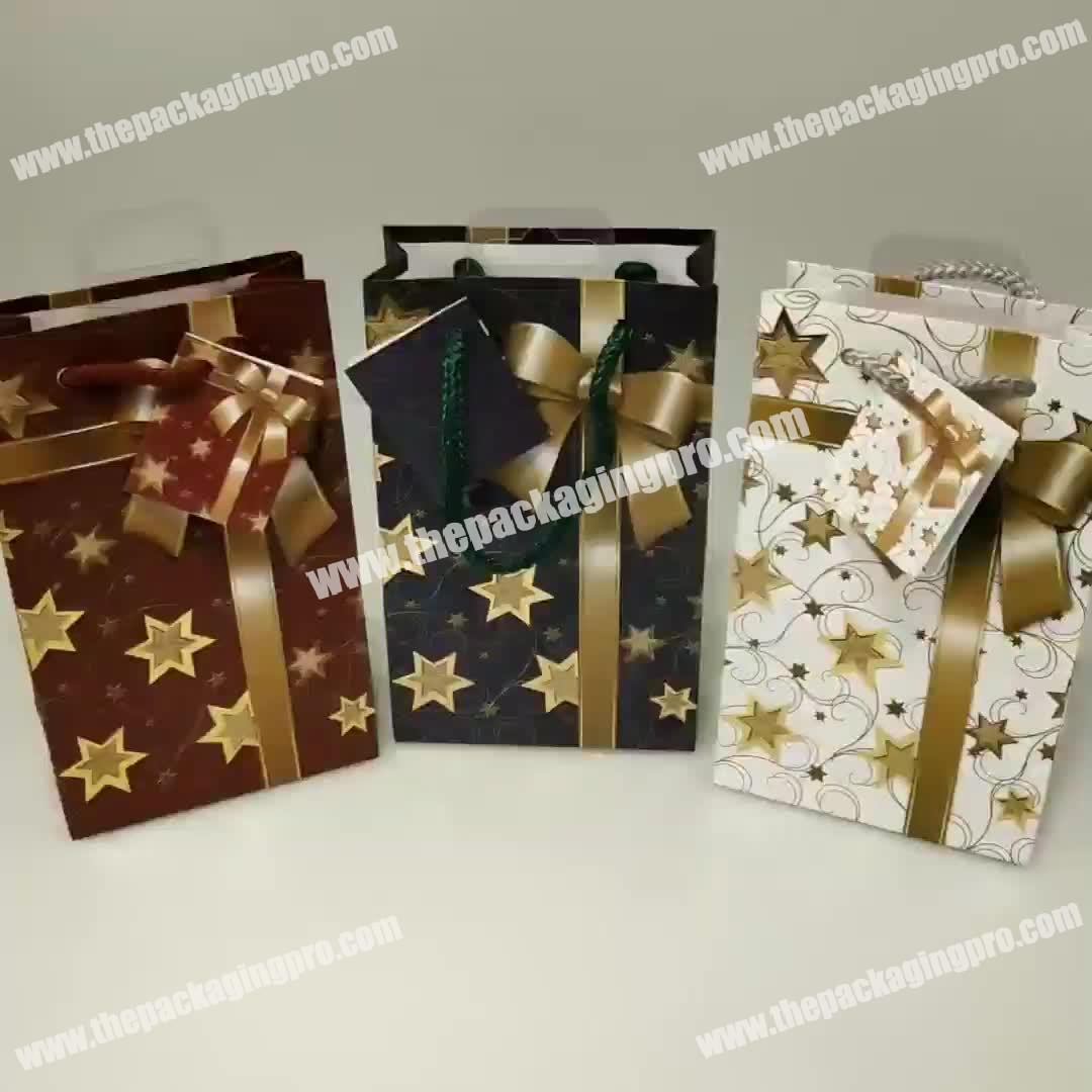 wholesale luxury golden Hotsatmping shopping packaging bag with tag
