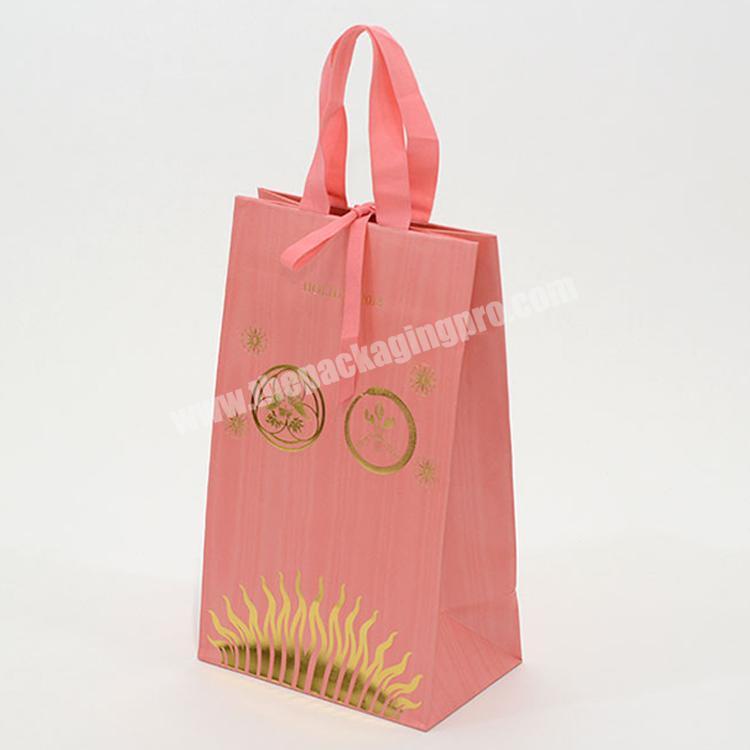 Wholesale pink clothes packaging bags paper bag with logo print
