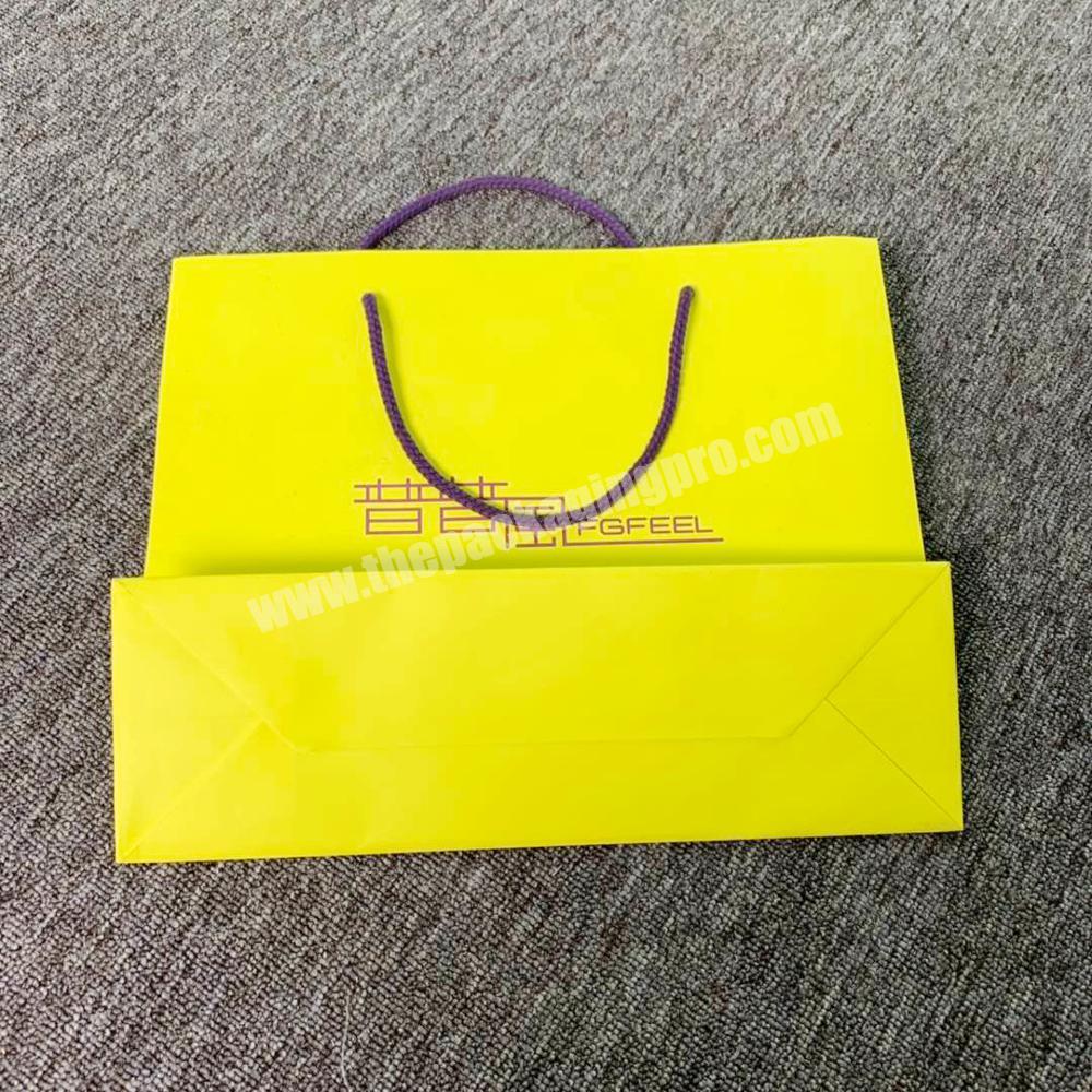 Wholesale recyclable gift paper bag packaging shopping bags with handles and logo
