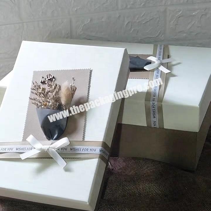Wholesale ribbon magnet lid luxury custom paper packaging gift box