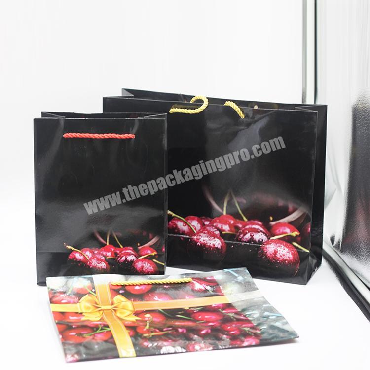 Wholesale spot goods custom luxury black shopping paper bag printing kraft gift packaging bag with logo print