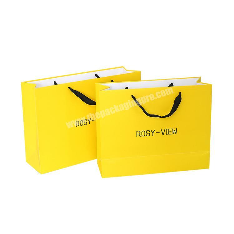 Wholesale White 350gsm shopping printed paper gift custom packaging yellow paper bags