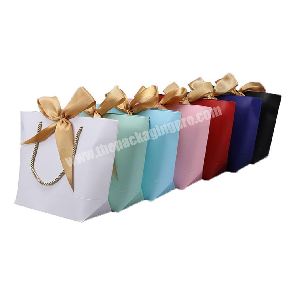 Women White Paper Shopping Gift Bag Hot Selling Packaging Bag With Ribbon For Shopping Clothes And Gift