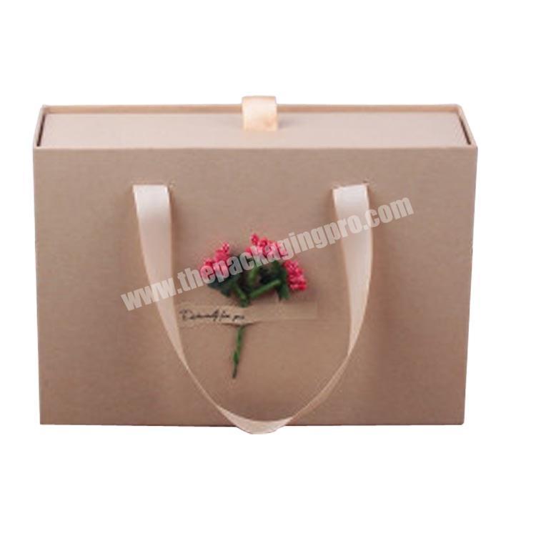 Yiwu factory customized kraft paper gift box, portable box  rigid cardboard can be carried with a ribbon clothing packaging