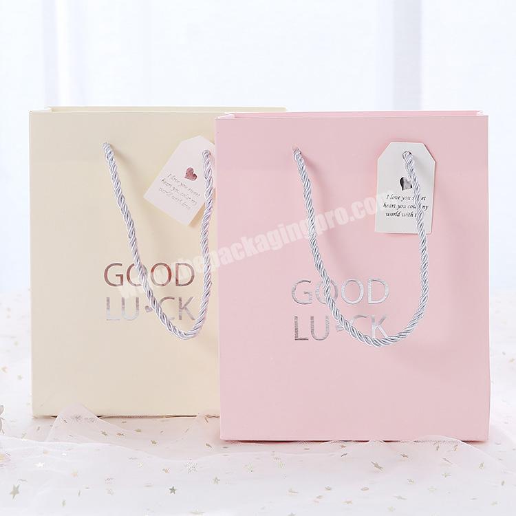 Custom Printed Logo Fashionable Retail Skincare Perfume Products Paper Gift Packaging Bags With Handles