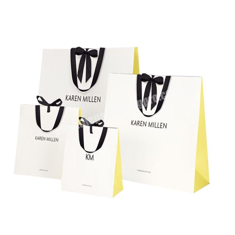 Fancy design cheaper price customized your own black  foil print white decorative paper  Jewelry  gift bags with rope handles