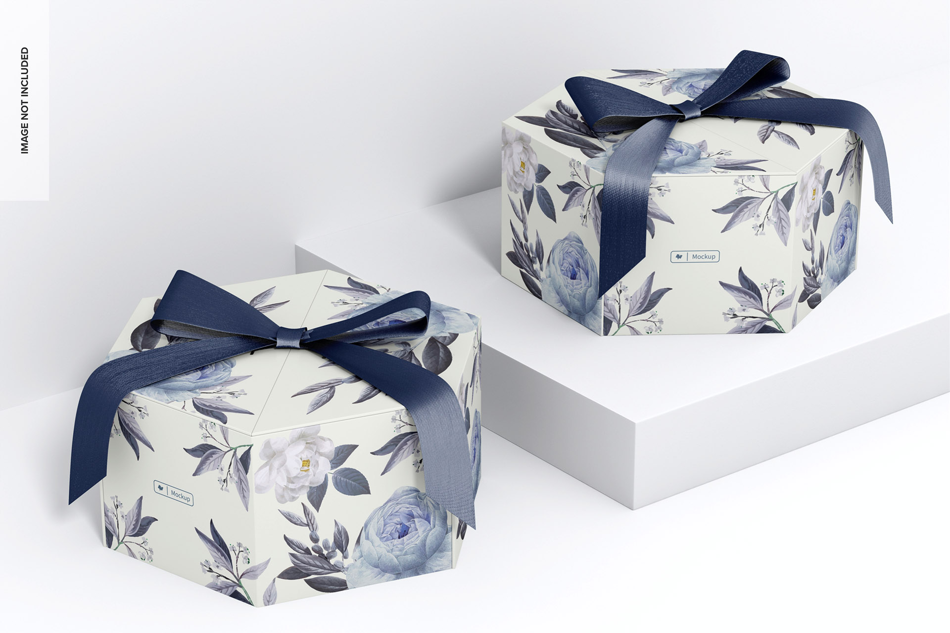 Hexagon gift boxes with ribbon mockup