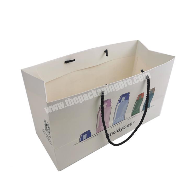 High Quality Custom logo printed  Paper Bag Luxury Gift Bag Packaging Shopping Bag with  handles for shoes and clothing