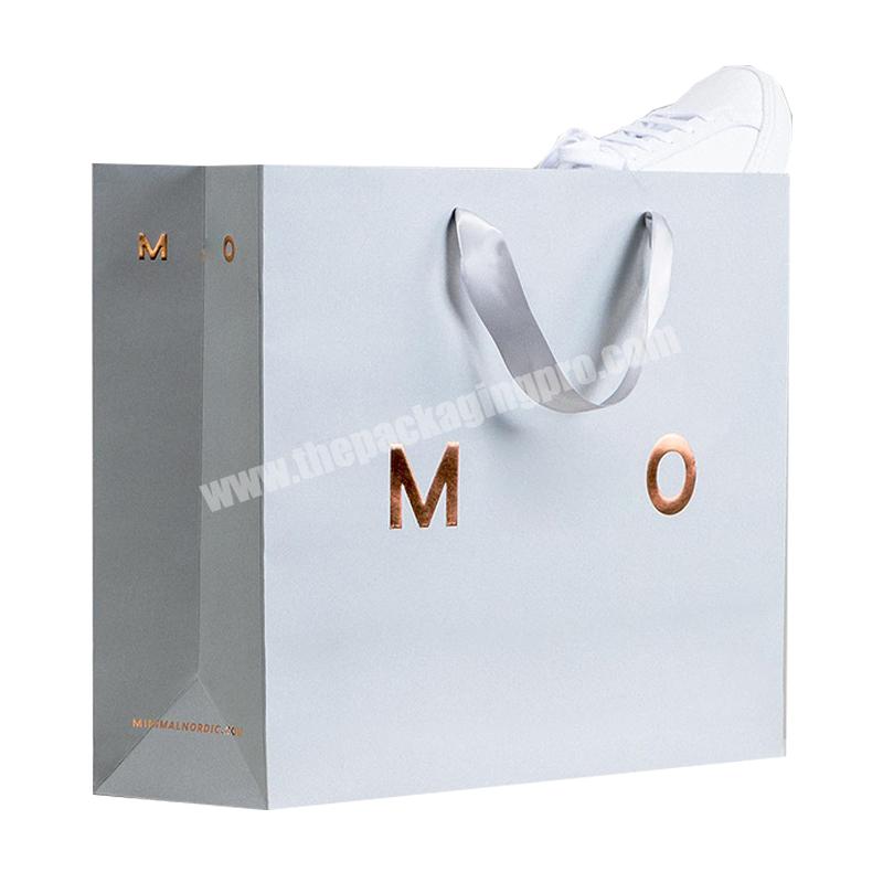 High quality Customized white gold foil embossed logo clothes shes packaging shopping gift bag with  ribbon handls