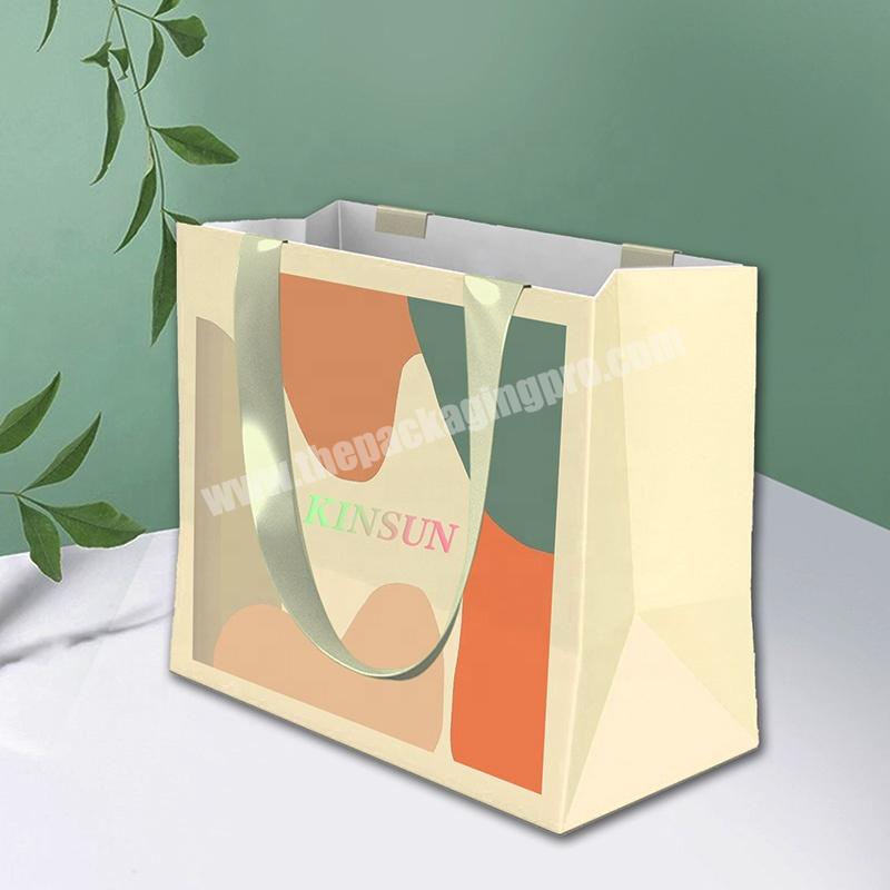 KinSun Free Design Custom Logo Apparel Paper Bag Custom Logo Gold Gift Shop Paper Bag Wholesale Clothing Paper Bag