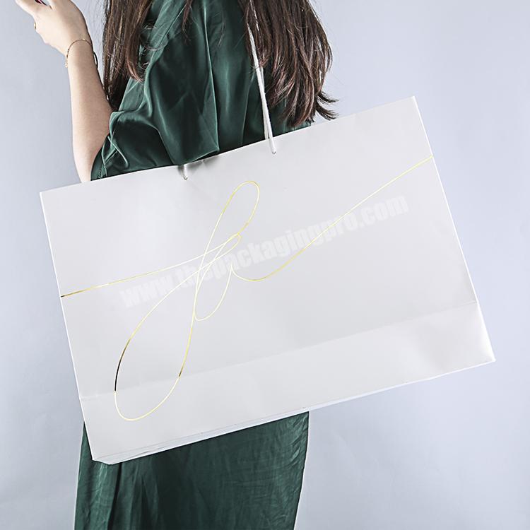 Luxury  hot stamping shopping box custom your logo printed fashion paper bag with ribbon for shoes and clothing