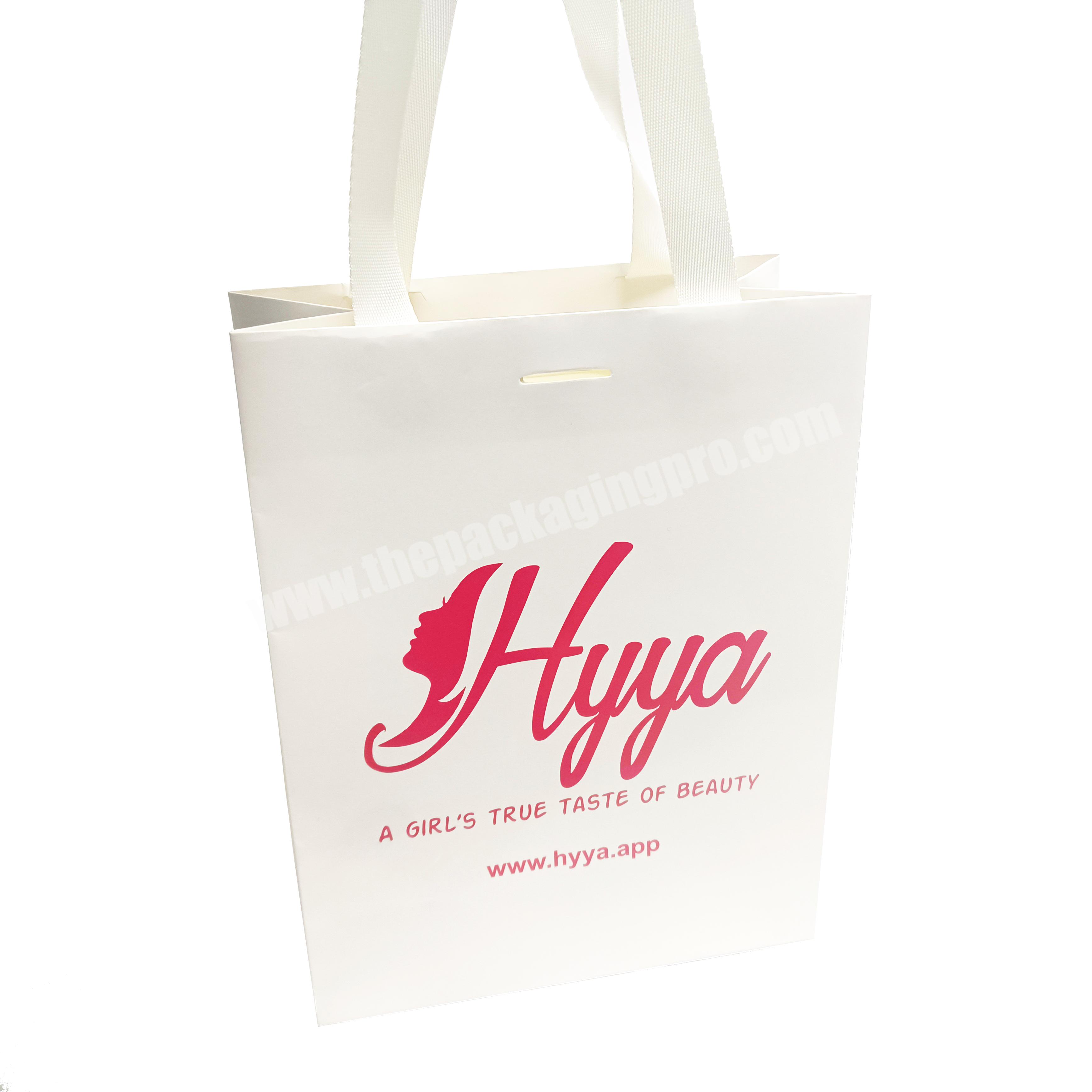 Luxury custom paper bag with your own logo gift paper bag manufactures custom clothing shopping bags