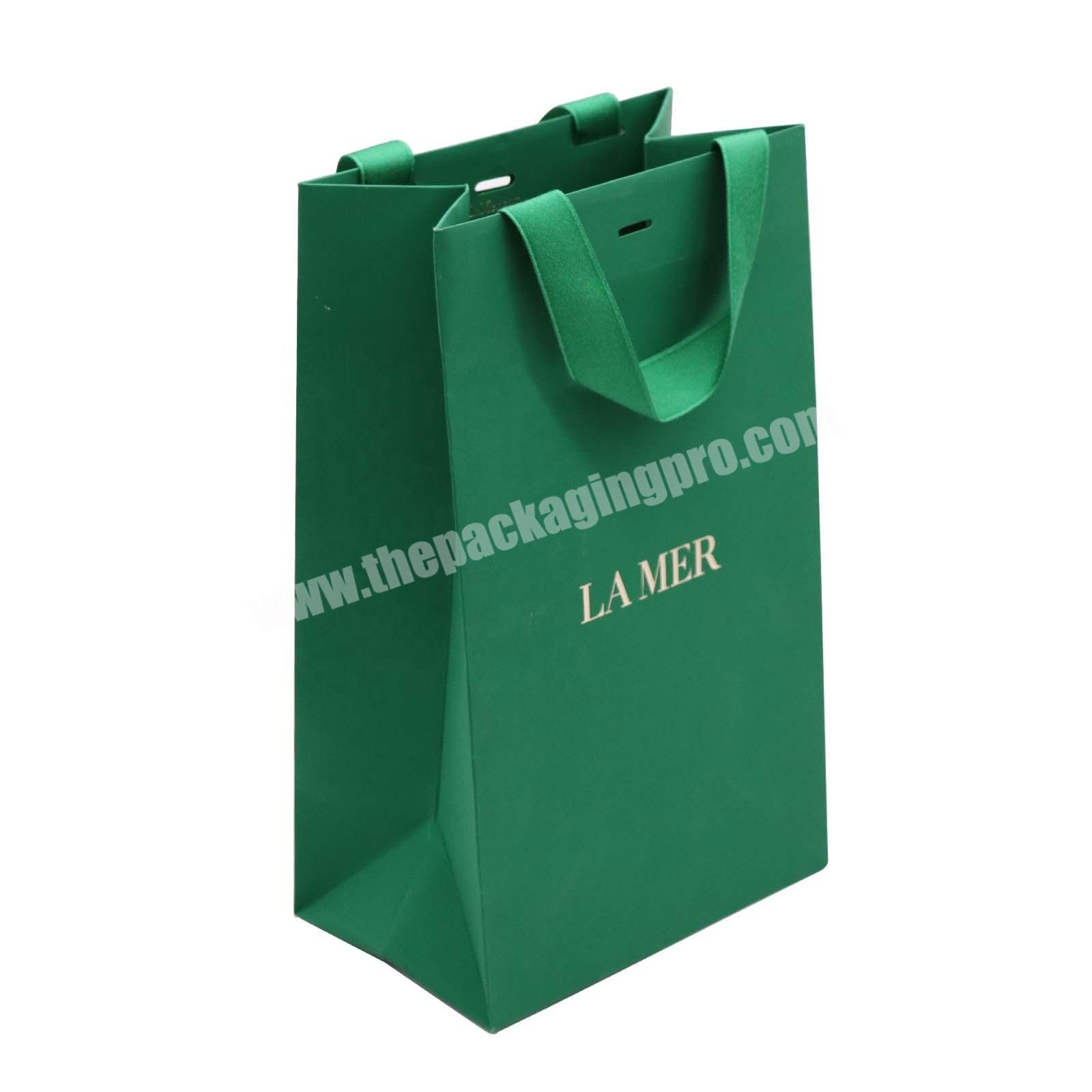 Luxury foil stamping paper gift bags with logos foldable paper shopping bags for cosmetic custom famous brand paper bags
