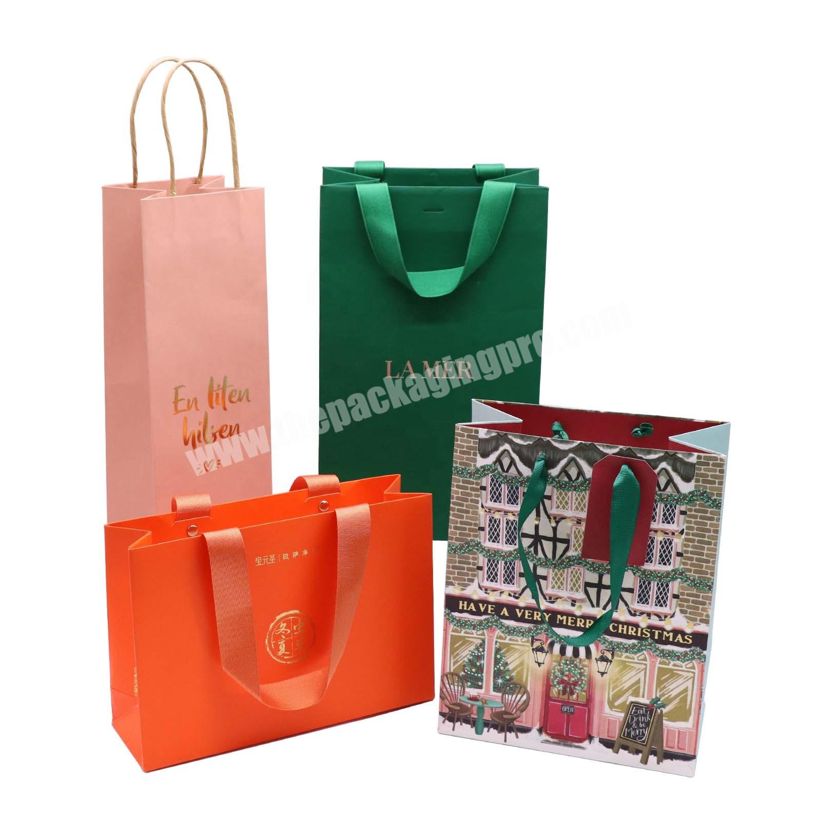 Luxury gold foil stamping paper party favor bags personalized christmas paper gift bags custom paper bags with handles