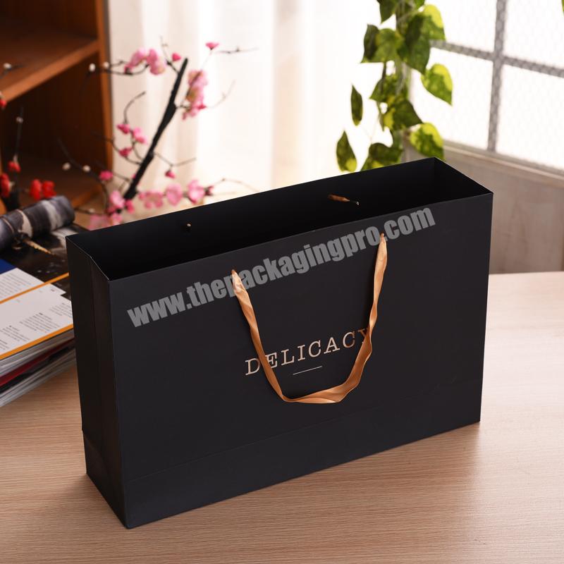 Luxury high quality custom logo printed hot stamping black gift bag with ribbon handle