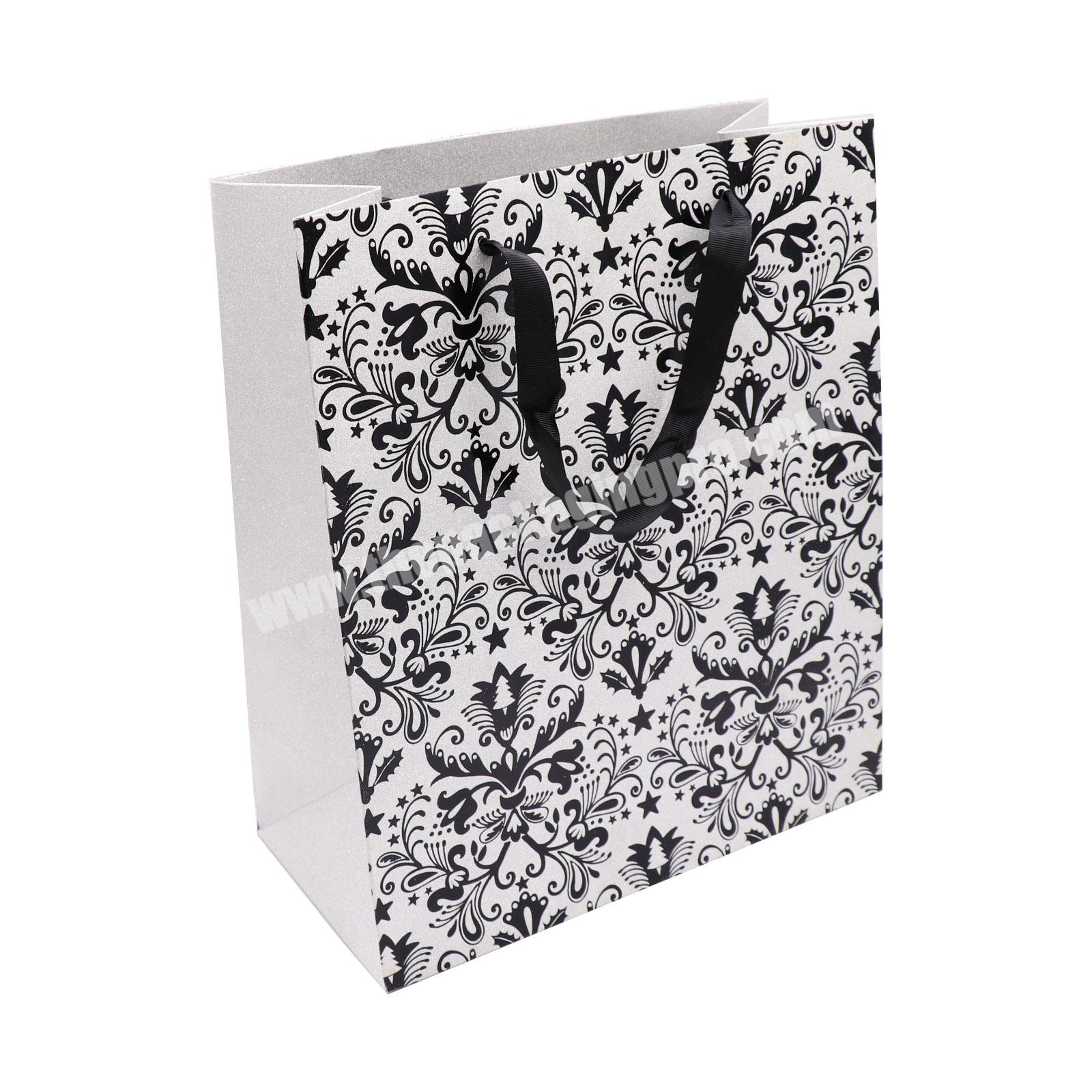 Luxury ramadan gift bags with custom logo reusable boutique paper shopping bags factory custom glitter paper bags