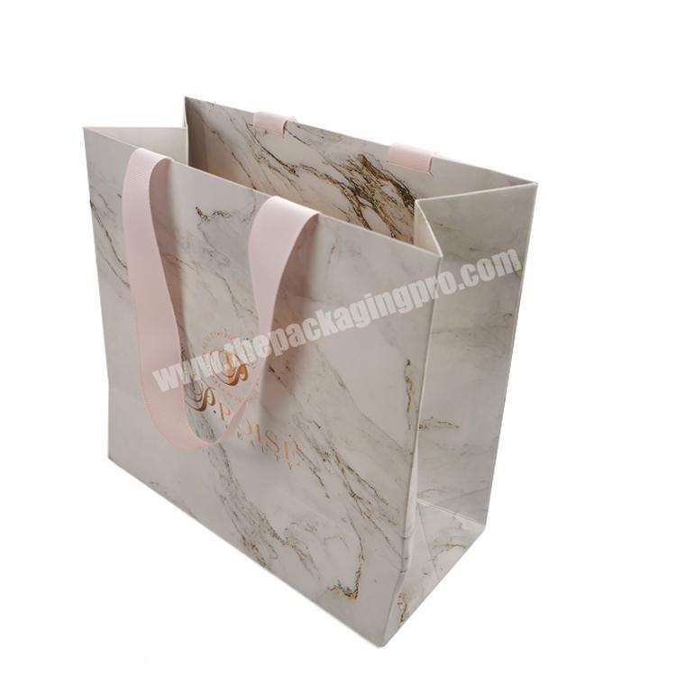 Luxury shopping paper bags wholesale recycled paper gift bags fashion  paper shopping bags with your own logo for clothing