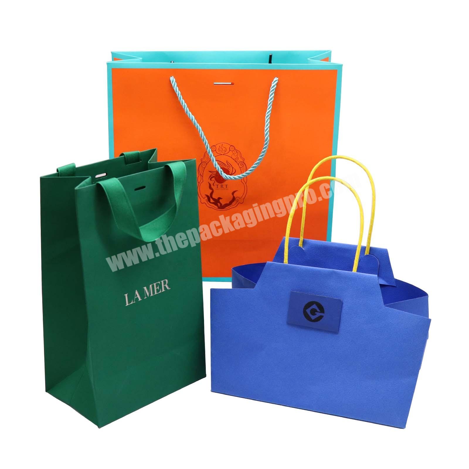 Paper eid mubarak gift bag with twist handle luxury paper tote shopping bags with logos custom textured paper bags