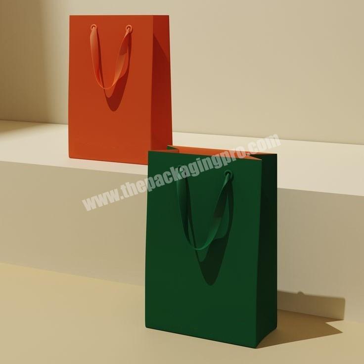 Personalized Logo Golden Hot Stamping Gift Paper Bags With Ribbon Rope  Paper Bag For Clothing