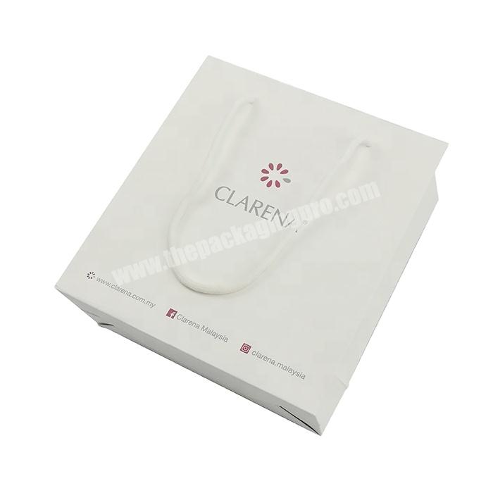 Recyclable custom logo printed reusable environment luxury good  paper bag package disposable