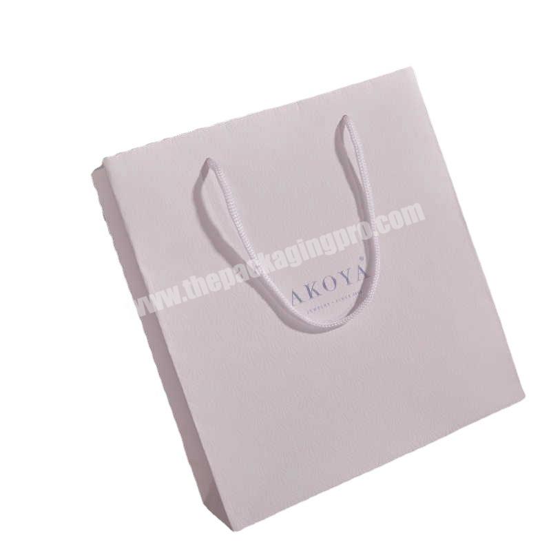 Wholesale Custom Logo Kraft Paper Bag Ribbon Cosmetic  Paper Shopping Gift Paper Bag