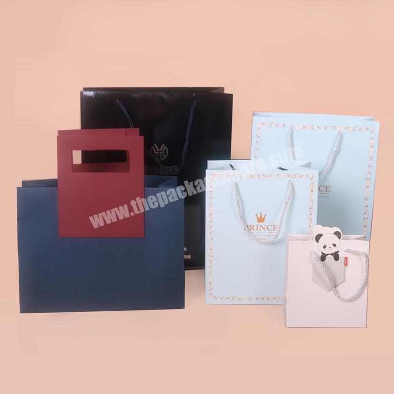 Wholesale Custom Printed  Logo Packaging Black Kraft Gift Craft Shopping Paper Bag With Ribbon Handle