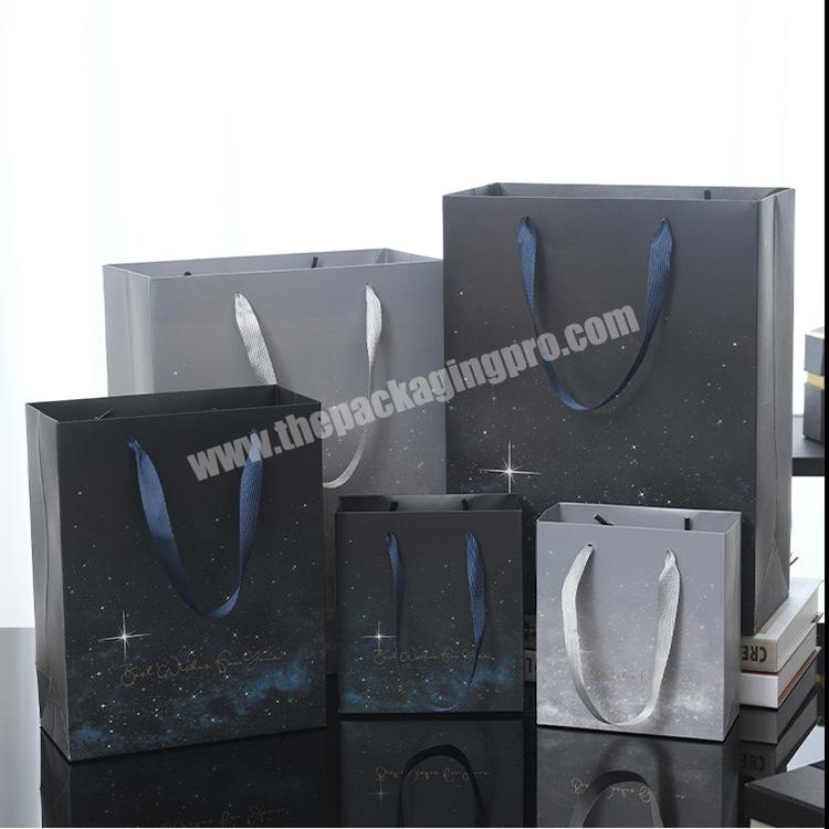 Wholesale Custom Printed Logo Branded Packaging Paper Gift Bag With Ribbon Handle For Shopping