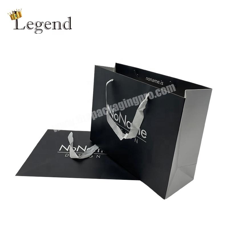 Wholesaler Gift Packaging Custom Size Embossed Silver Printing Foil Stamping Boutique Shopping Paper Bag