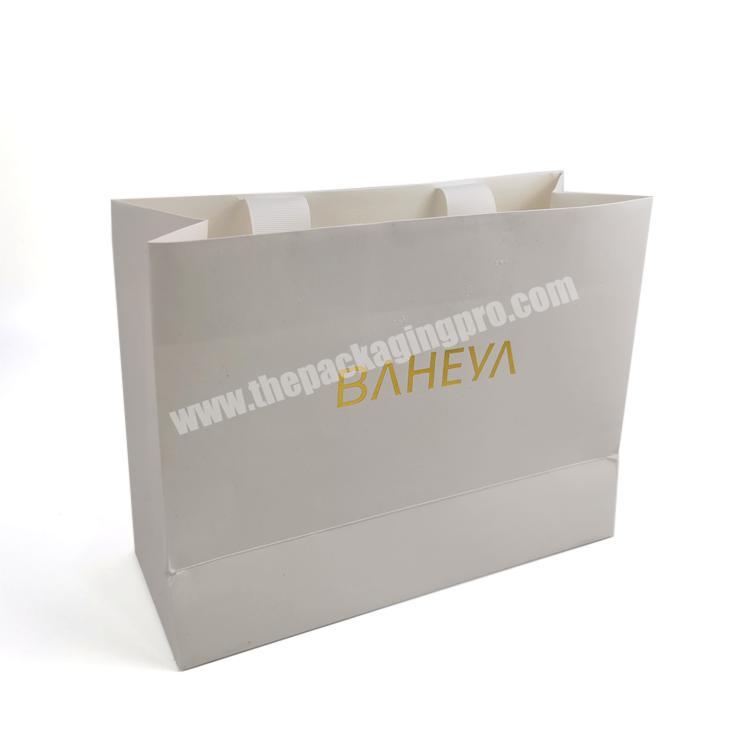 luxury shopping paper bag recycled cosmetic kraft paper bag with own logo
