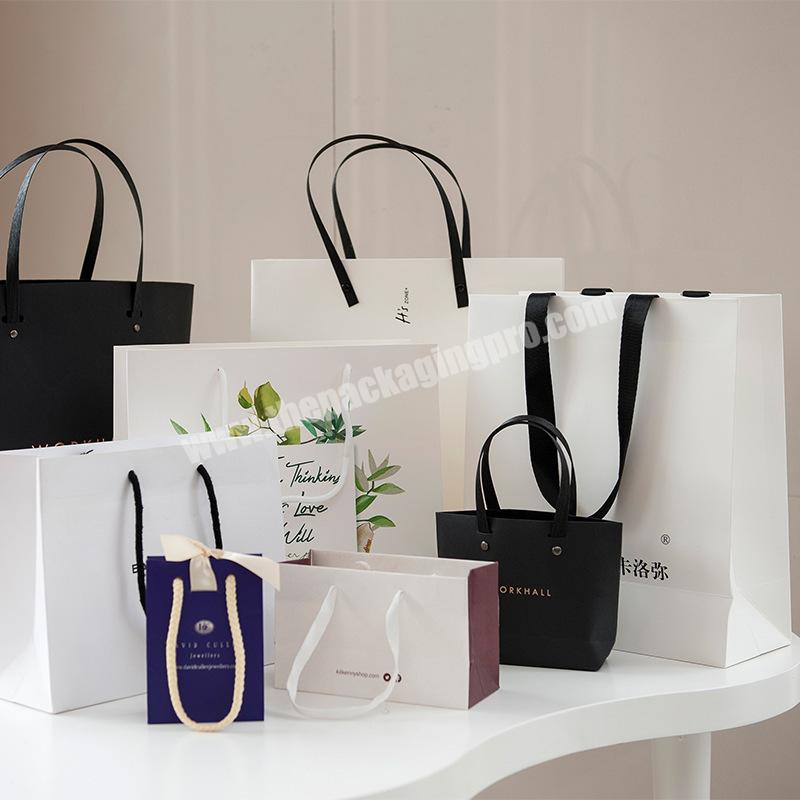 China Factory Your Own Logo Tote Boutique Retail Clothing Packaging Shopping Gift Paper Bags