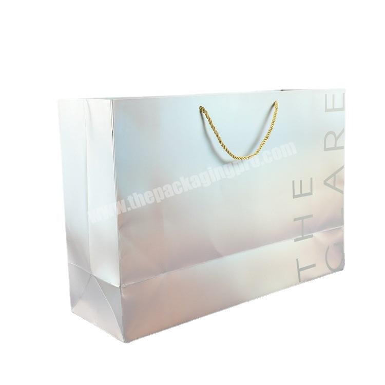 China Manufacturer Custom Brand Logo Fancy 250gsm Cardboard Gift Bags Shopping Packaging Bags