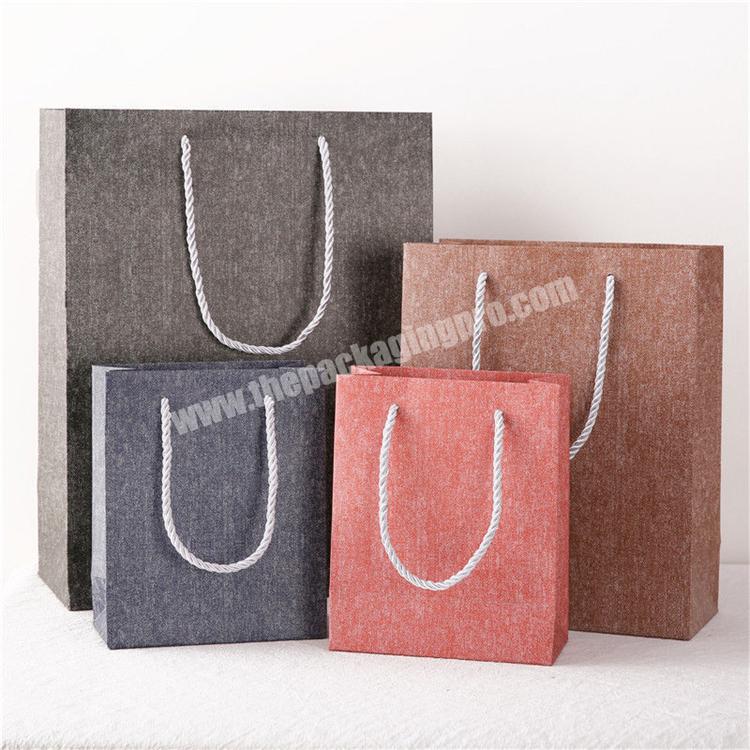 China Manufacturer Custom Linen Pattern Cardboard Paper Bags Gift Packaging Shopping Bags