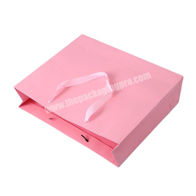 China Supplier Quality Pink Cardboard Matte Cosmetic Garment Clothing Boutique Packaging Shopping Paper Bags