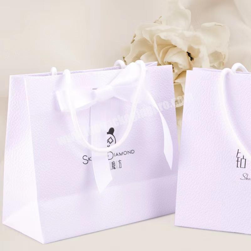 Custom Logo Luxury White Texture Lichee Pattern Cosmetic Jewelry Paper Bag With Ribbon Bow