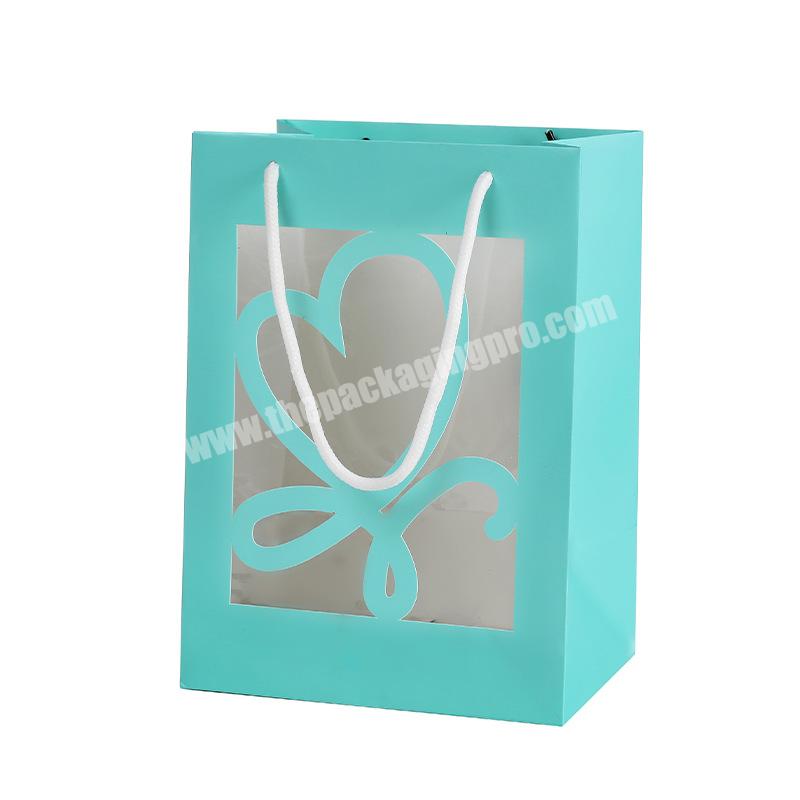 Custom hollowed out pattern printed transparent gift paper bag wedding flower packaging bag