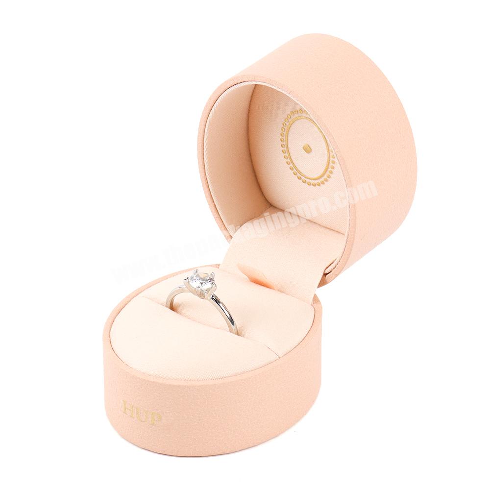 Custom jewelry boxes with logo packaging wedding ring gift flip oval pink box for jewelry ring high end luxury pink jewelry box