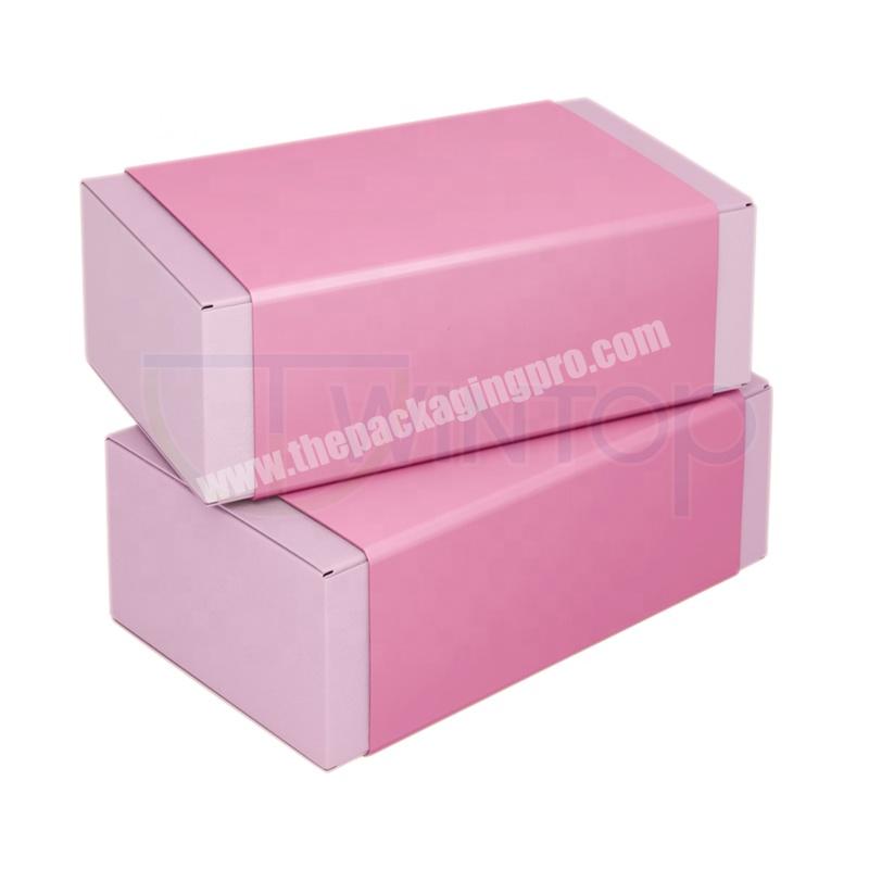Pink packaging mailer box with paper sleeve
