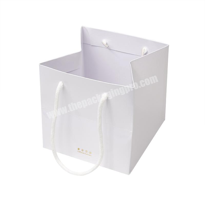 Small white color custom paper gift bags with your own logo gold foil stamping with handle