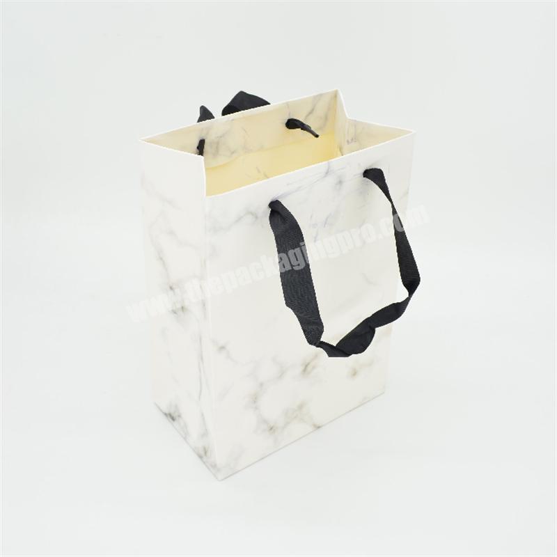 White Wholesales Custom Logo Luxury Paper Bag Clothing Packaging Shopping Gift  Paper Bag For Shoes With Handle Ribbon