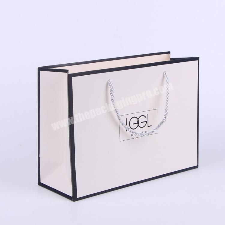 Wholesale China Factory Rope Handle Art Paper White Garment Craft Gift Shopping Paper Bags with Logos