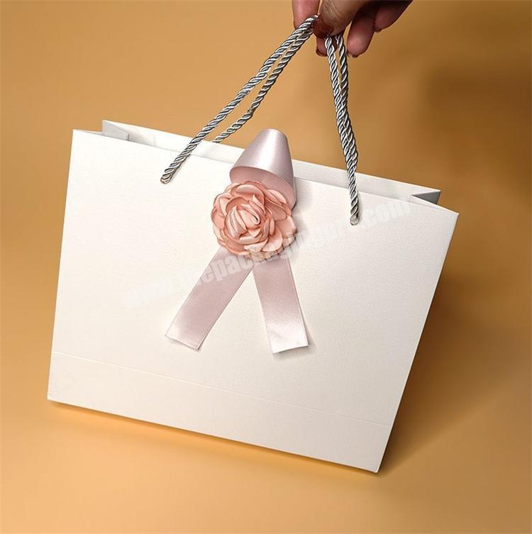 Wholesale Handle and Ribbon Wedding Celebration Gift Packaging Boutique Shopping Paper Bag