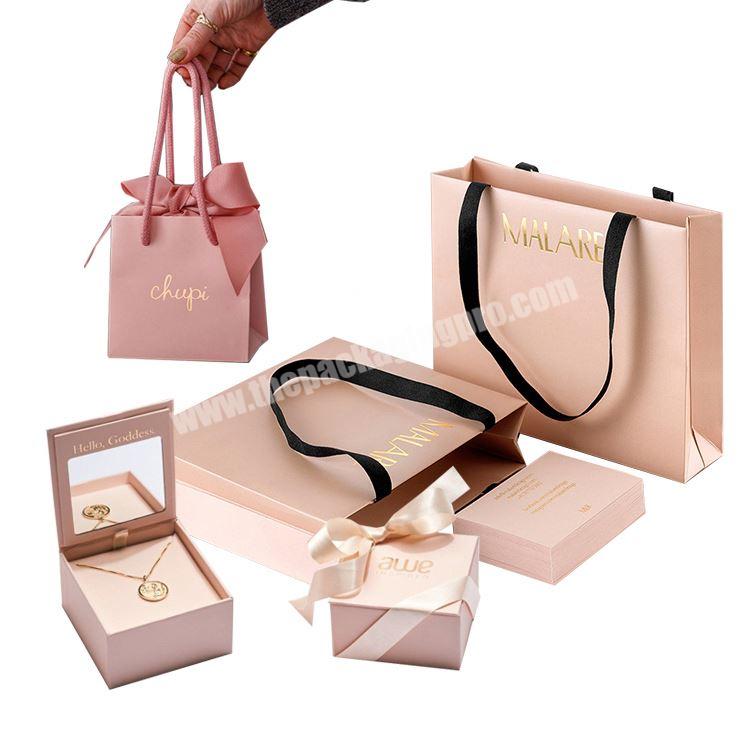 Wholesale custom printed premium luxury deluxe  boutique golden stamping shopping gift paper bag with ribbon